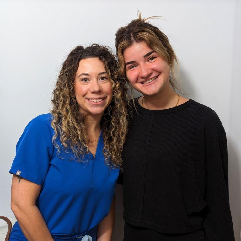 Best Cosmetic Dentist Miami Deering Dental in Palmetto Bay, near Pinecrest guest Izzy with a team member after treatment
